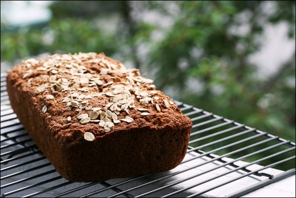 loaf of spelt bread on a cooling rack