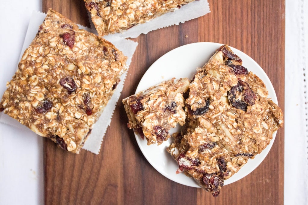 granola bars on a wooden cutting board