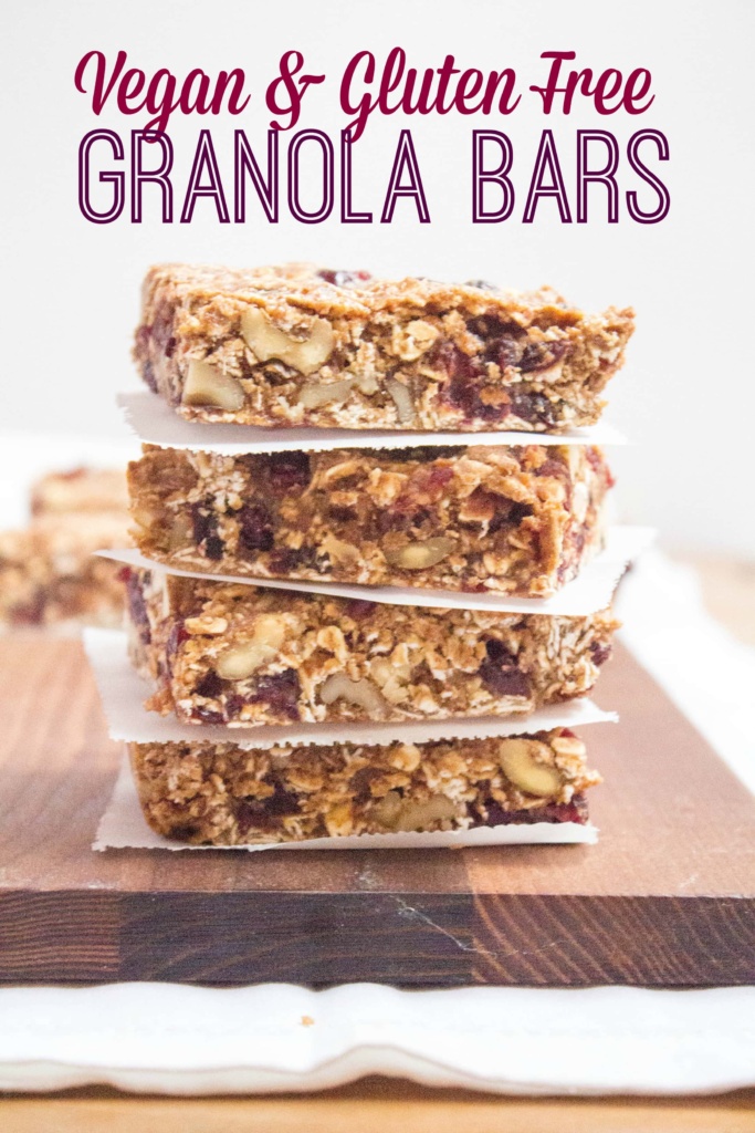 Gluten Free and Vegan Granola Bars stacked with parchment paper