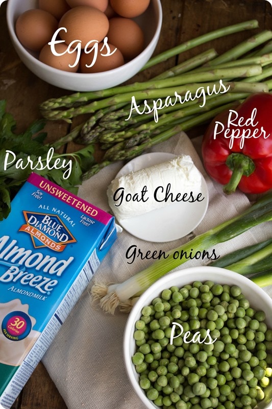 Crustless Veggie Quiche Ingredients: eggs, goat cheese, peppers, peas and asparagus