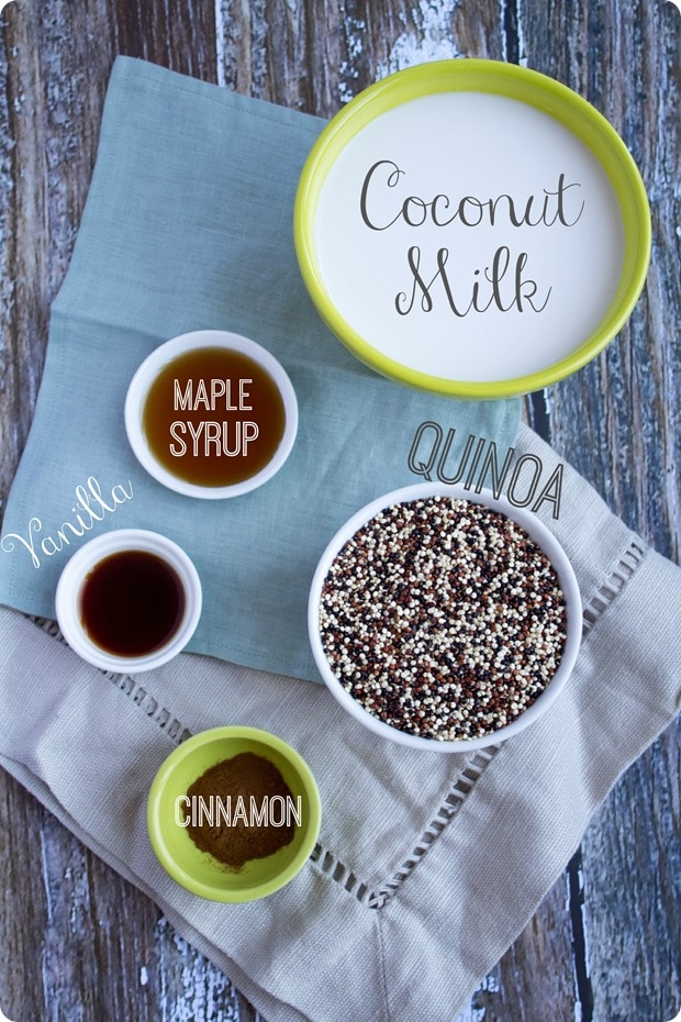 uncooked quinoa, coconut milk, maple syrup, cinnamon, and vanilla extract in small bowls on a wooden surface