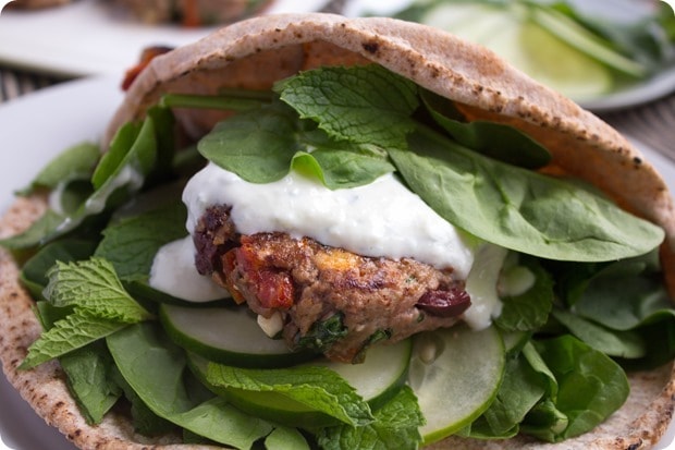 greek lamb burgers 8 a ground lamb burger with sun-dried tomatoes drizzled with yogurt sauce in pita bread