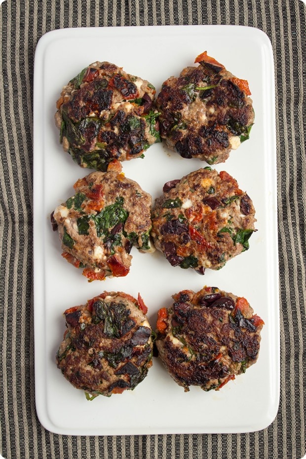 greek lamb burgers step 3 cooked lamb burger patties on a white platter