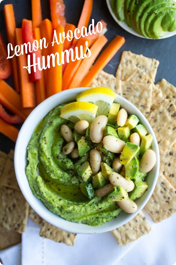 lemon avocado hummus lemon avocado white bean hummus in a small white bowl with carrots and crackers