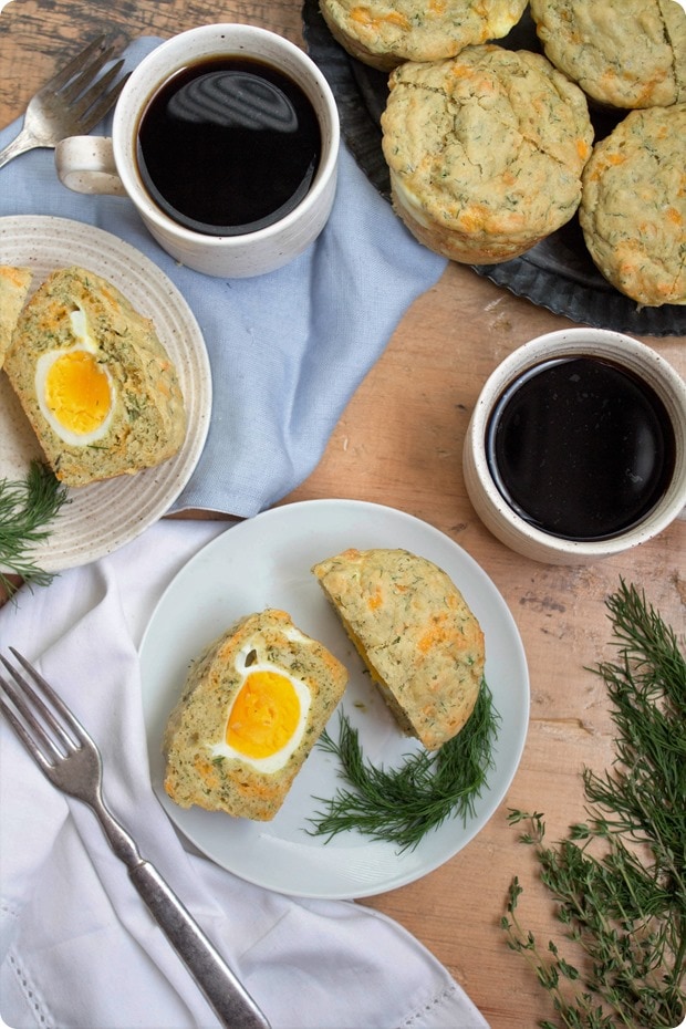 gluten free hard boiled egg muffins gluten free savory muffins on plates with coffee mugs beside them