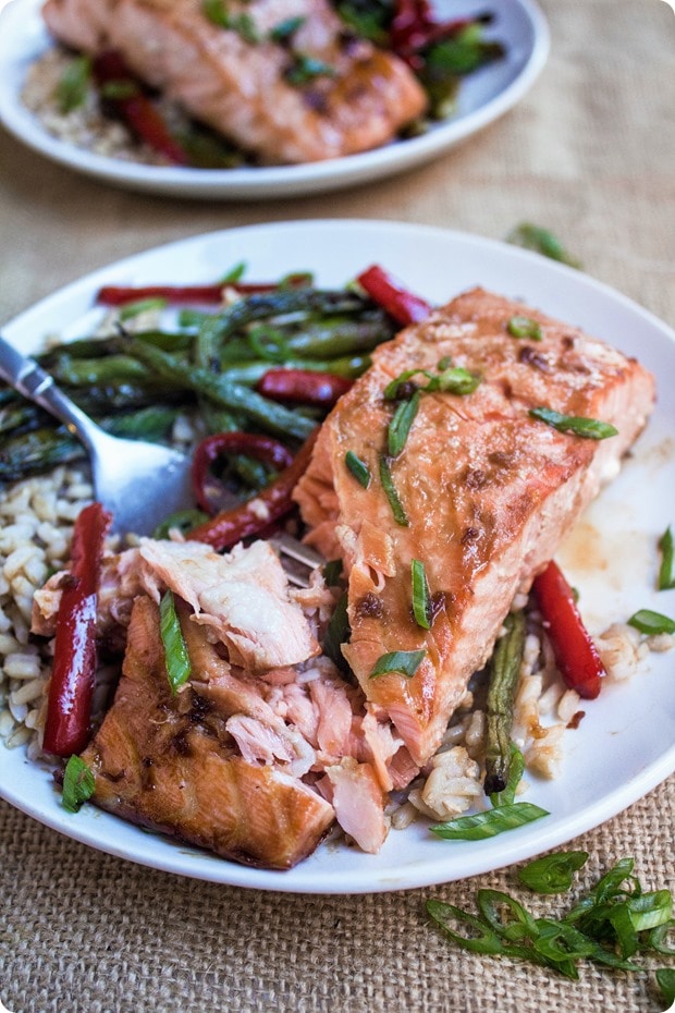 sheet pan ginger soy salmon 7 roasted salmon with vegetables and brown rice on a plate