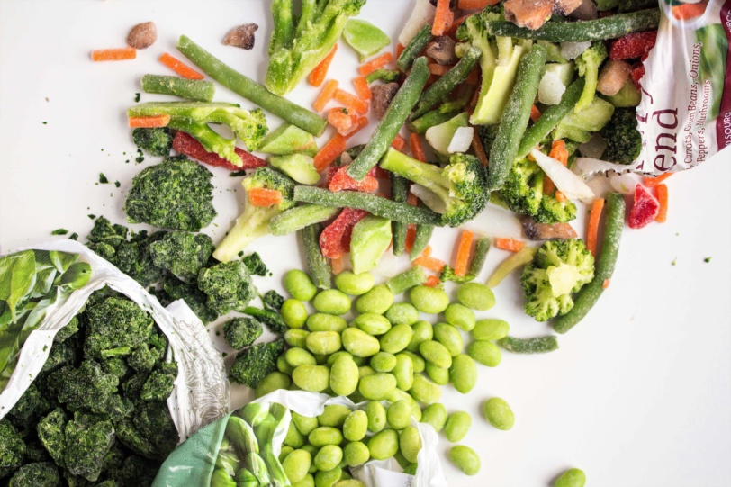 A bag of mixed frozen vegetables with broccoli, carrots, and edamame