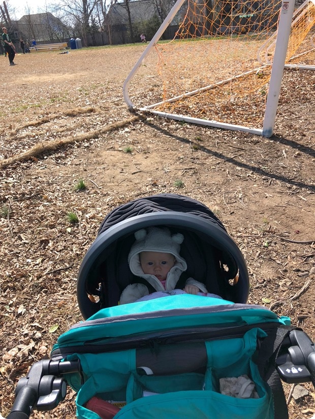 baby stroller at soccer field