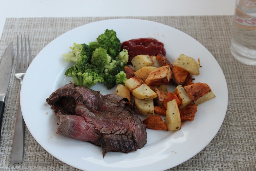 marinated flank steak with potatoes and broccoli