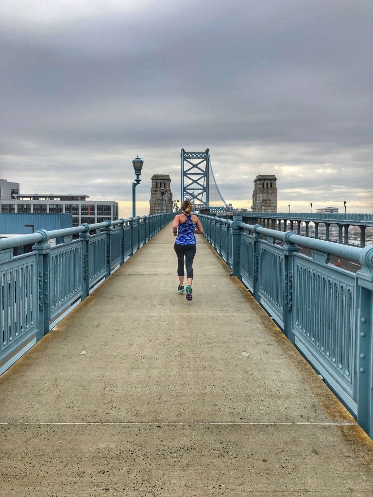 running the benjamin franklin bridge in philadelphia