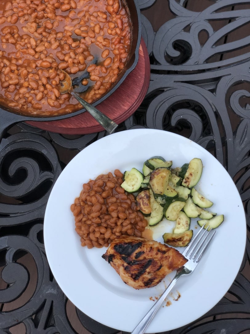 chicken and baked beans on grill