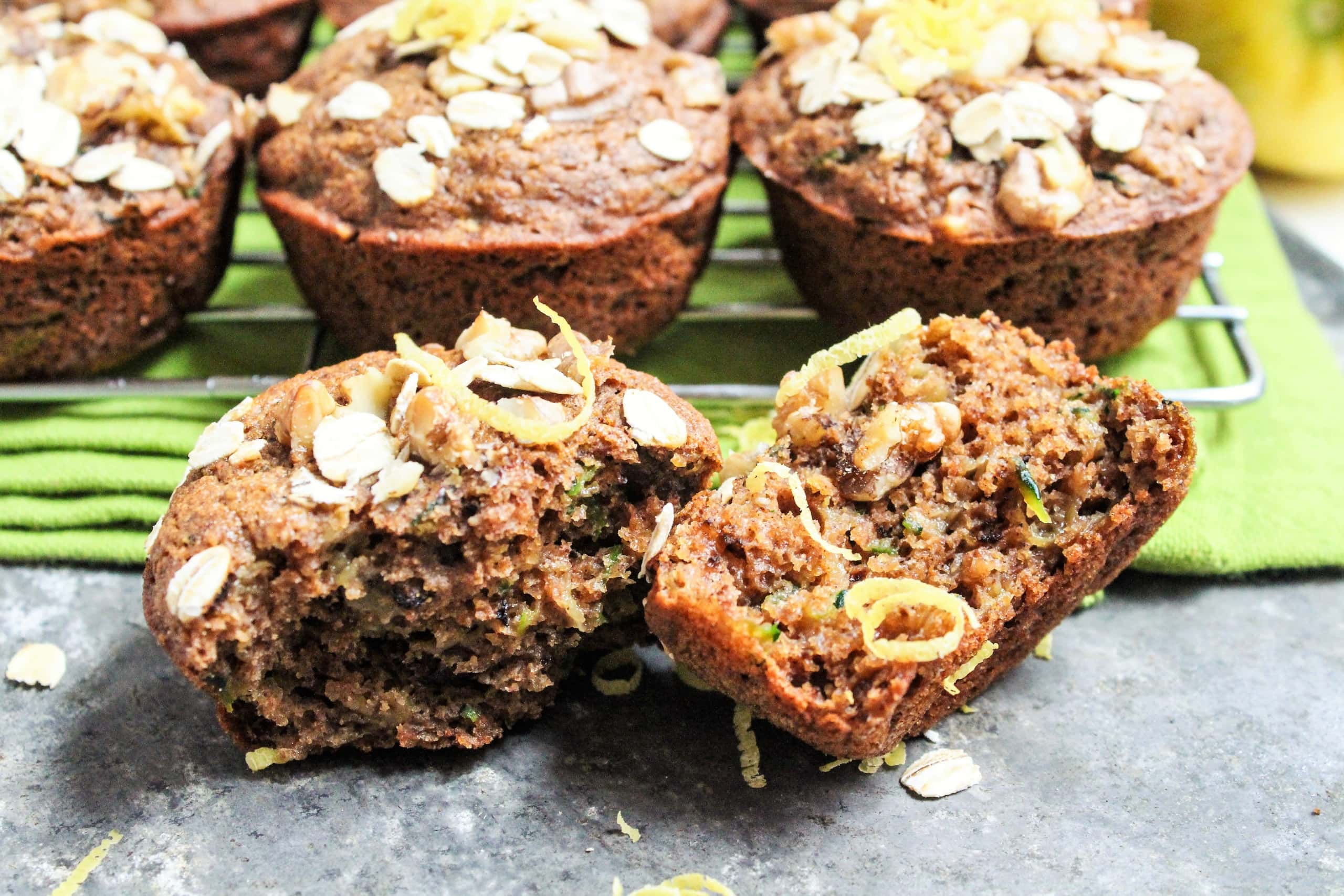 lemon zucchini muffins torn in half