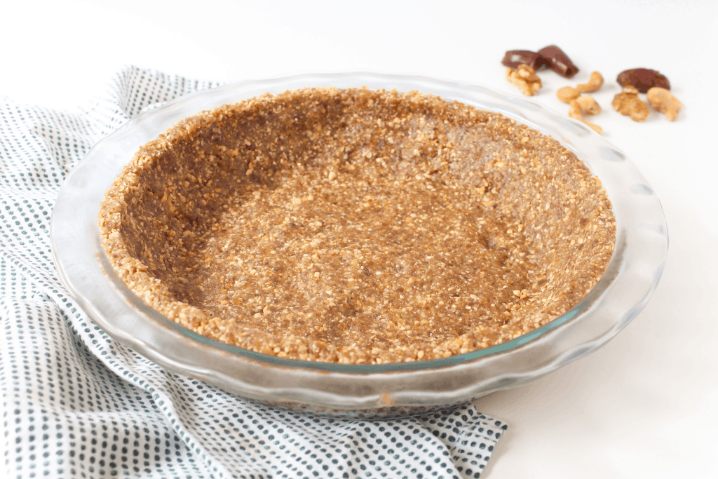 vegan pie crust in a glass dish