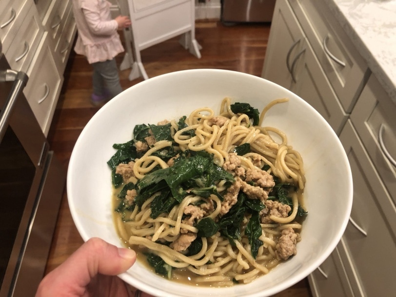 delicious noodle pork asian dish with kale