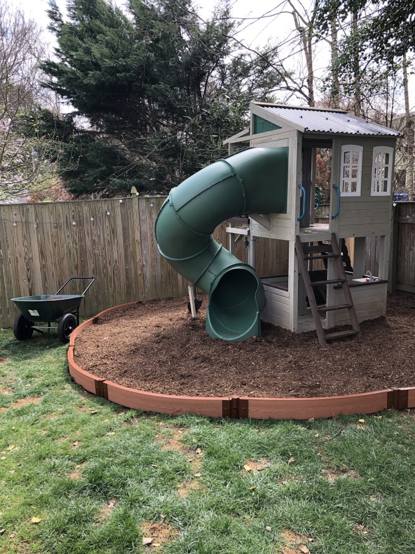border around outdoor playhouse for kids