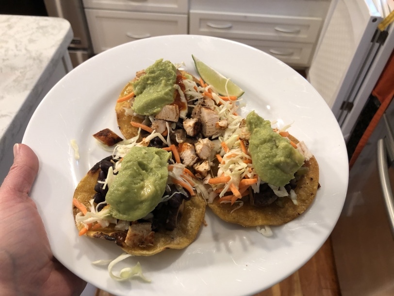 black bean and chicken tostadas with slaw and guacamole