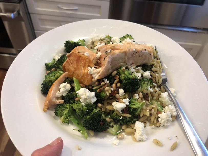 seared salmon with orzo, feta, broccoli, roasted red pepper