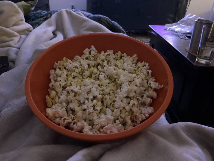 popcorn in front of the TV