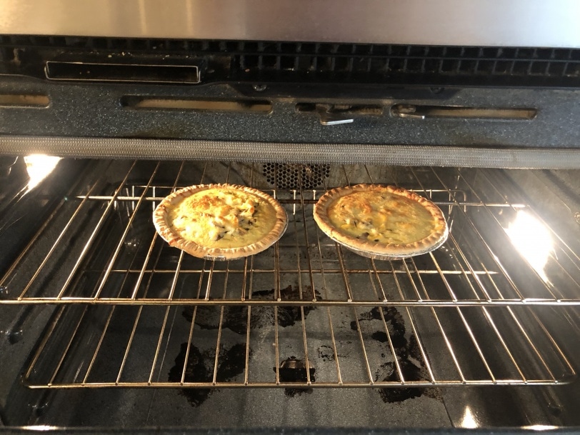 quiches cooking in oven