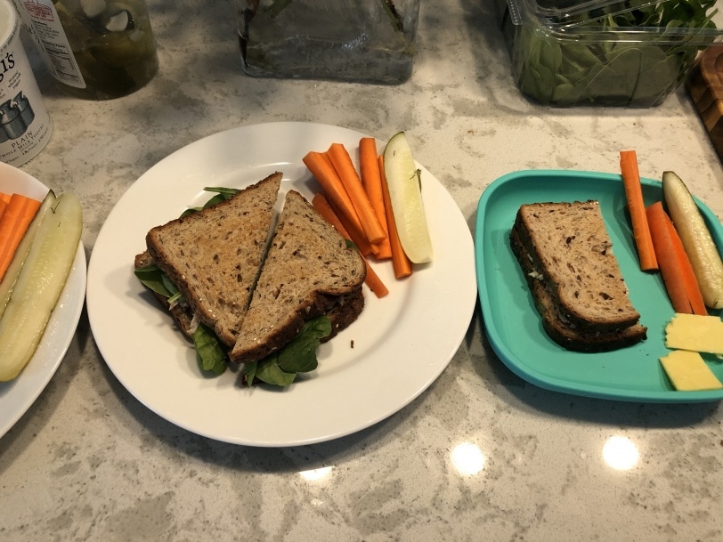 tuna sandwiches for lunch with pickles and carrots