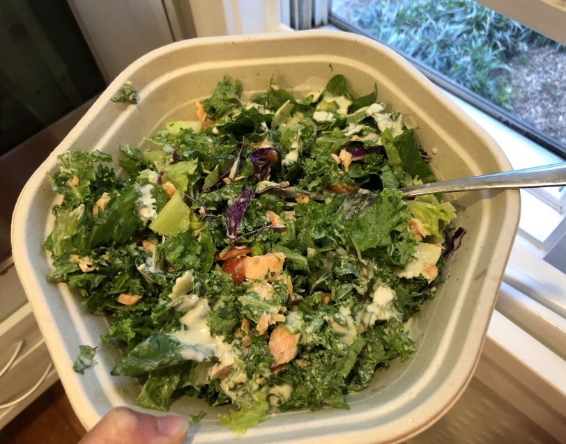 kale caesar salad with salmon