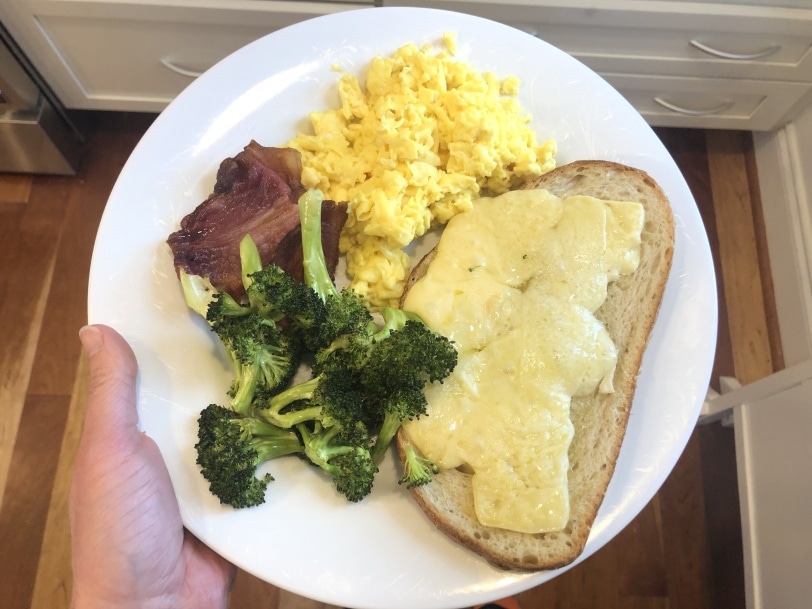 cheese toast with scrambled eggs roasted broccoli and bacon