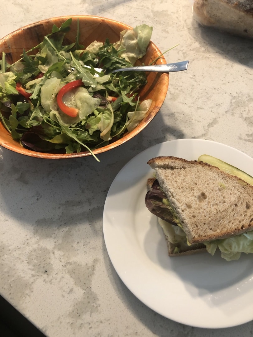 turkey sandwich with a side salad