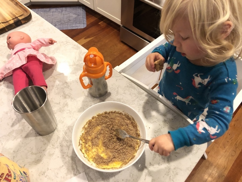 helping cook breakfast