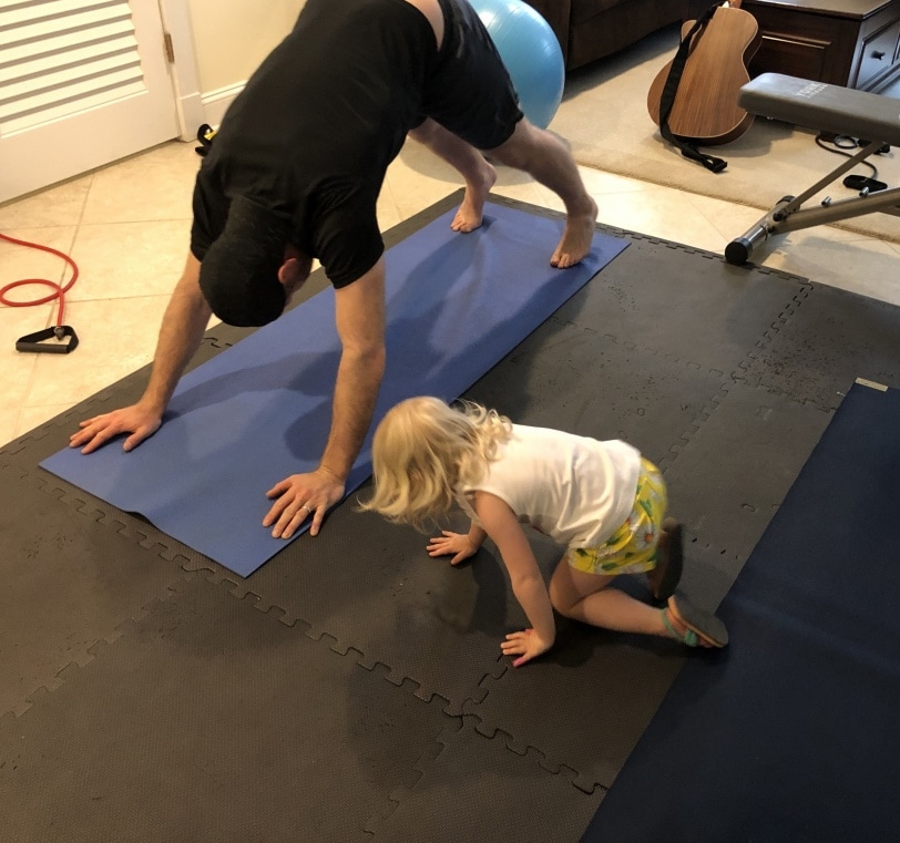 toddler and dad doing planks