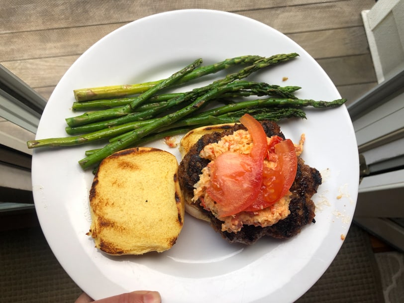 burgers with pimento cheese, tomato, and asparagus