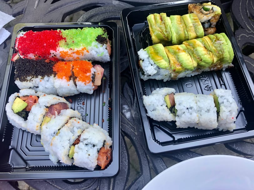 two boxes of sushi from sushi bar del ray