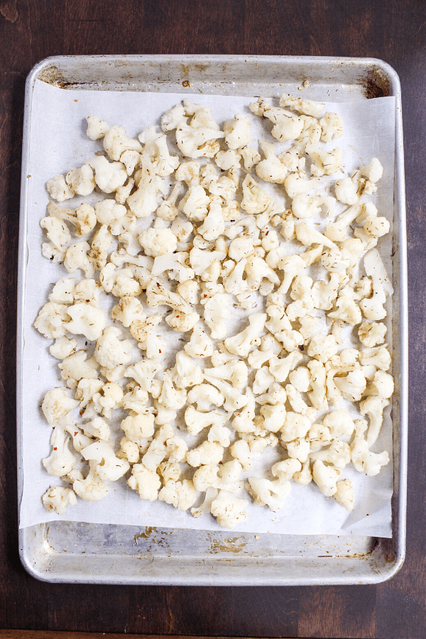 frozen cauliflower on baking sheet