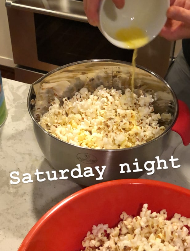 butter being drizzled over popcorn