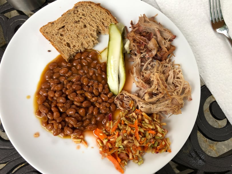 homemade pulled pork with homemade vinegar based slaw, baked beans, and toast