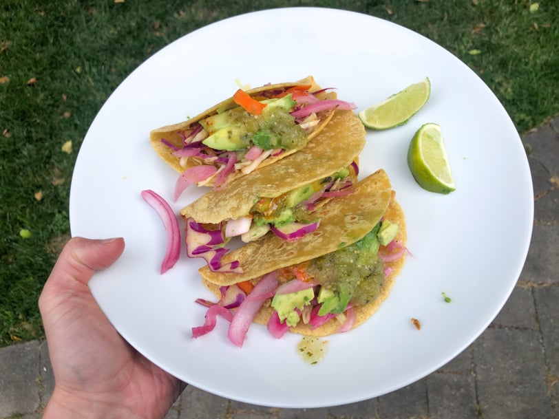 pork tacos with pickled onion and avocado