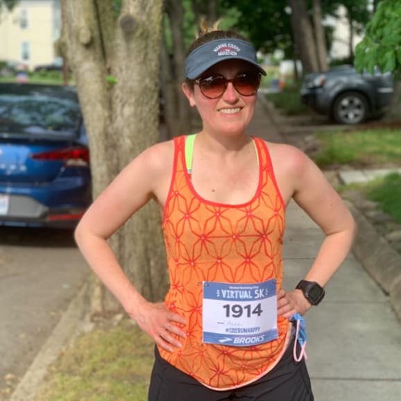 runner in an orange tank top