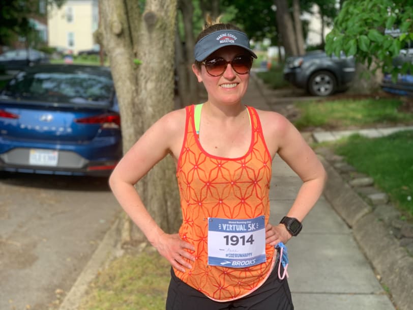 runner in an orange tank top