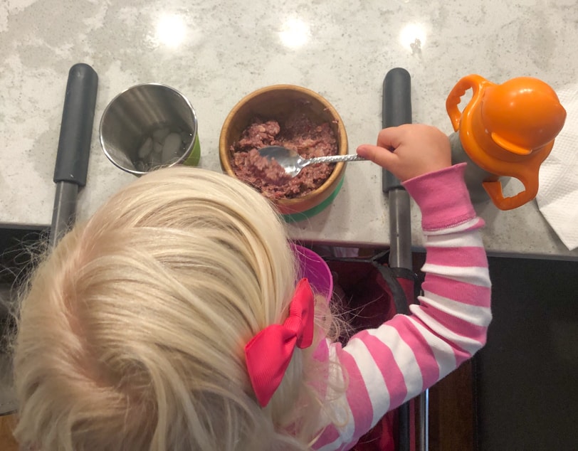 toddler eating oatmeal