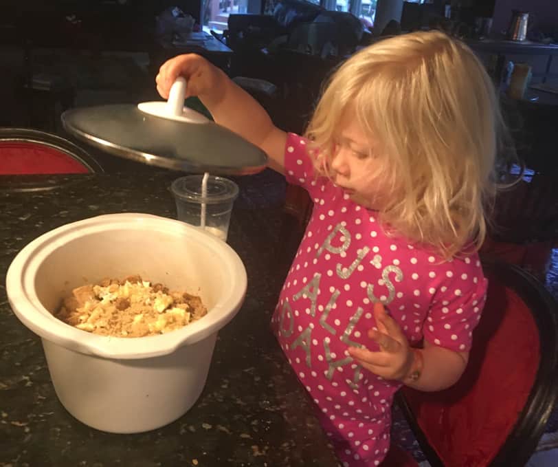 helping make overnight french toast casserole