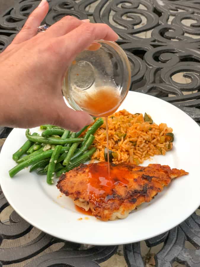 hot honey chicken with green beans and dirty rice