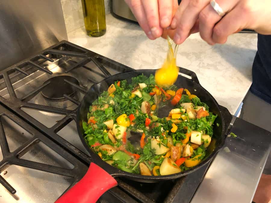 kale and potato hash with eggs and cheddar
