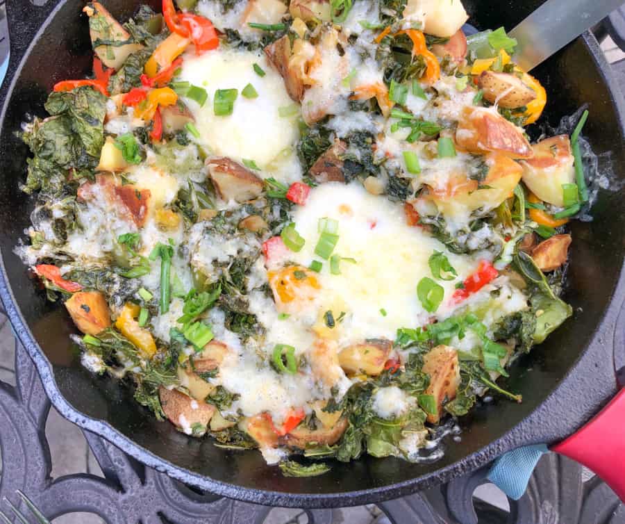 kale and potato hash with eggs and cheddar