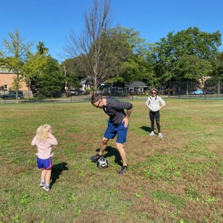 toddler playing soccer