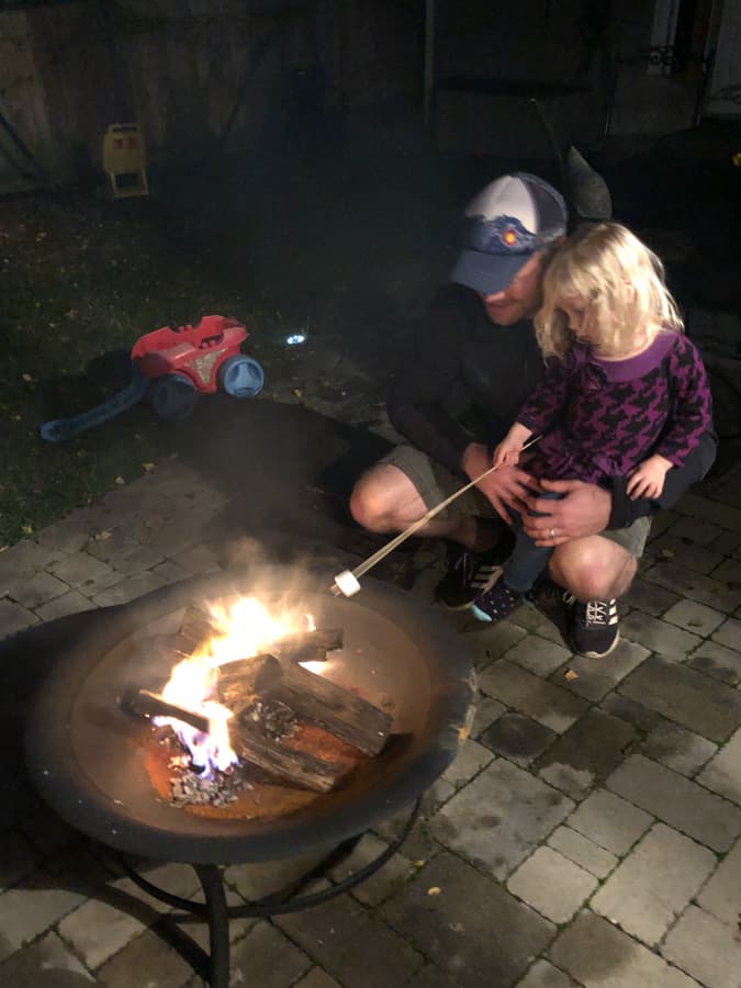 making smores over a fire pit