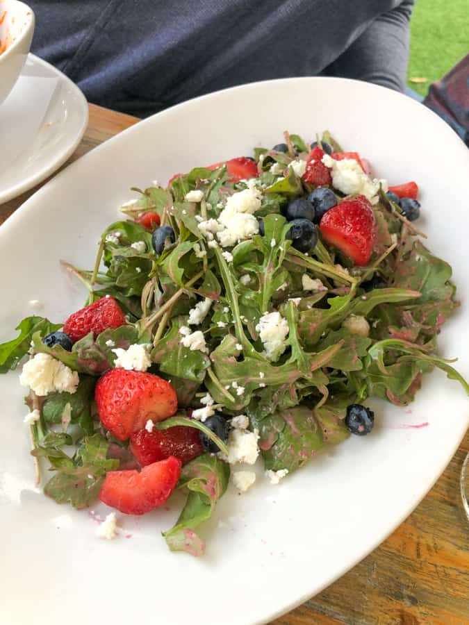 salad with berries and popcorn from eveningstar cafe