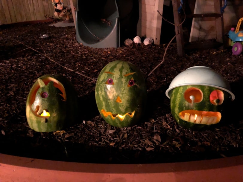 carved watermelons lit up