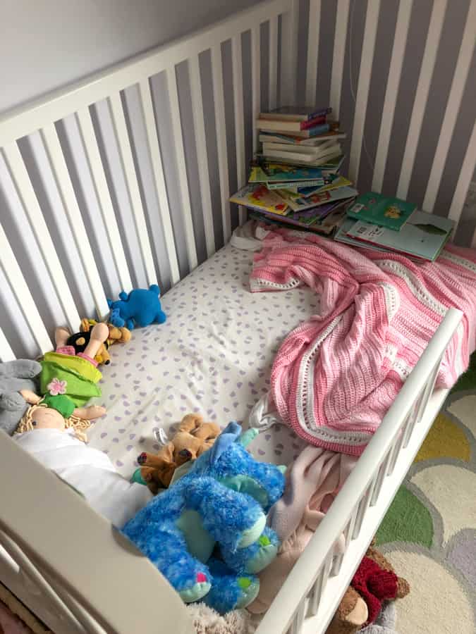 toddler bed with tons of books