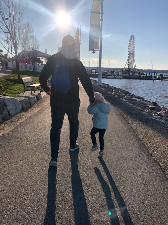 walking along the water at national harbor
