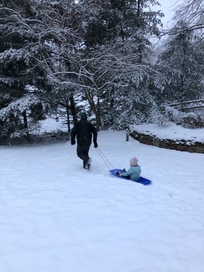 sledding in the backyard