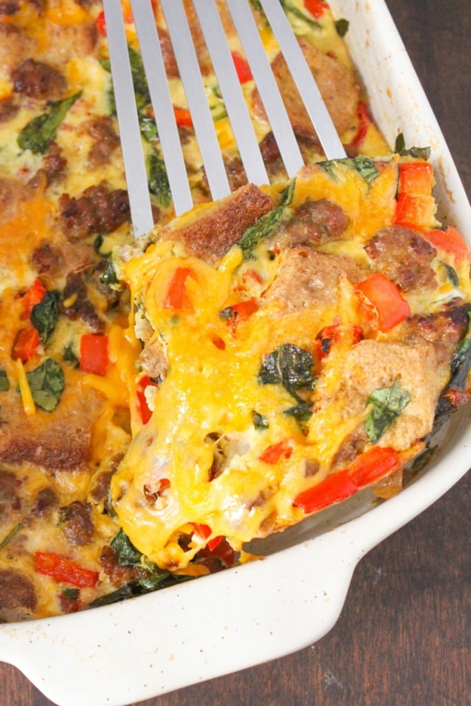 sausage egg casserole slice sitting on a spatula